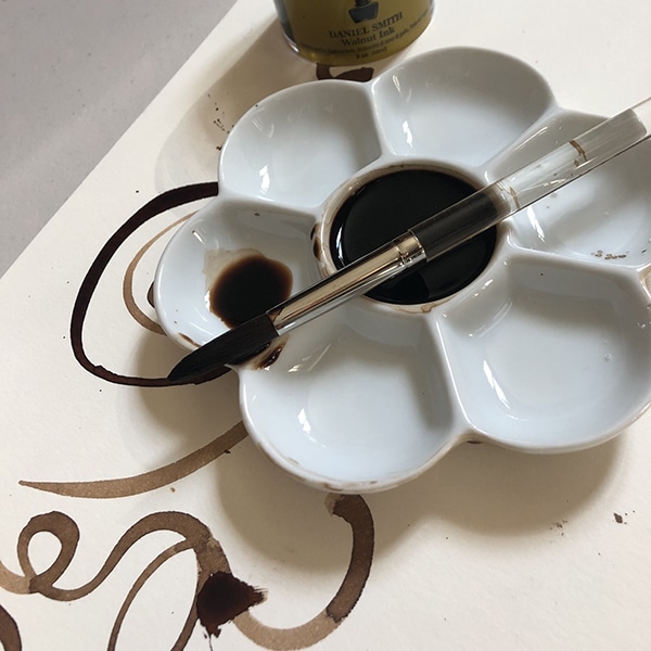 Walnut Ink - Walnut ink in palette with brush